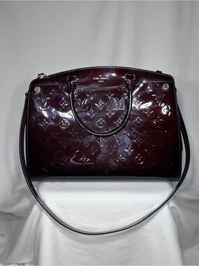 Louis Vuitton Brea top handle bag in Amarante Vernis leather gold hardware